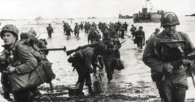 If you're looking for places to visit in Dorset, this photo shows US troops arriving on the Normandy beaches following embarkation at Portland, Dorset UK on 6th June 1944